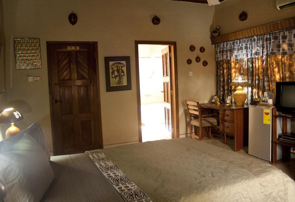Four Villages Inn Kumasi Quarto foto