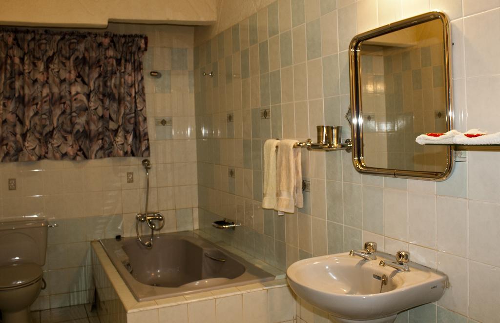 Four Villages Inn Kumasi Quarto foto
